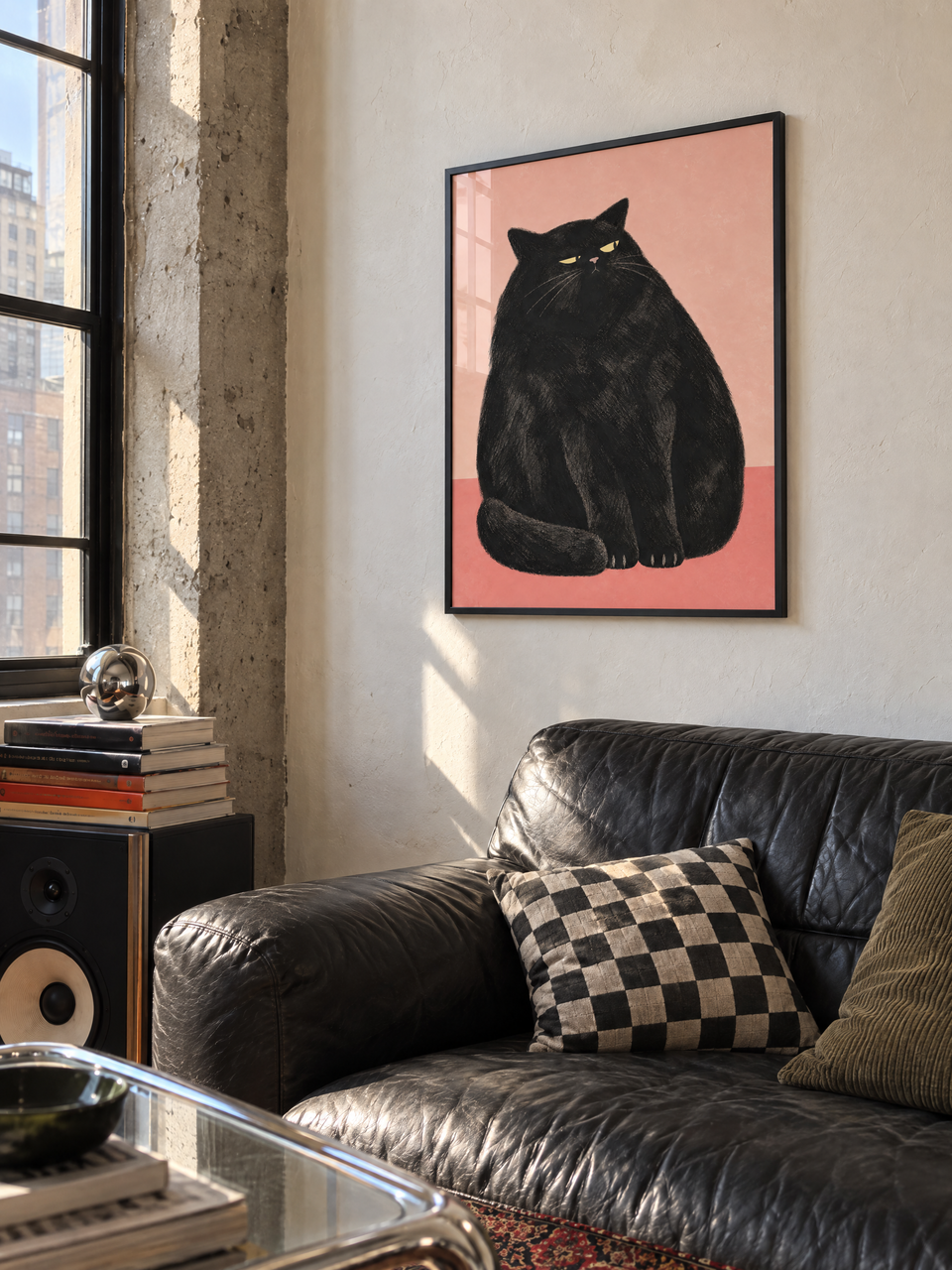 Framed The Ick black cat art print displayed in a bright modern loft interior