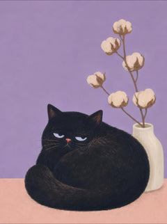 Round black cat curled beside a white vase of cotton flowers against a lavender background — Still Life by Sasha Liley